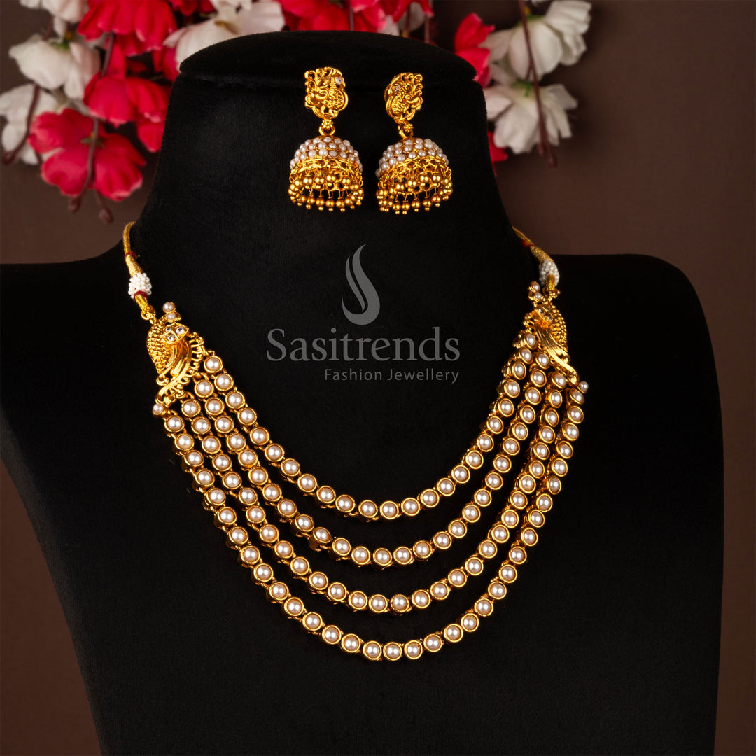 Stunning matte gold splendid peacock temple necklace jewellery set featuring lustrous white stones and grand jhumka earrings, offering a graceful and divine appeal - Sasitrends