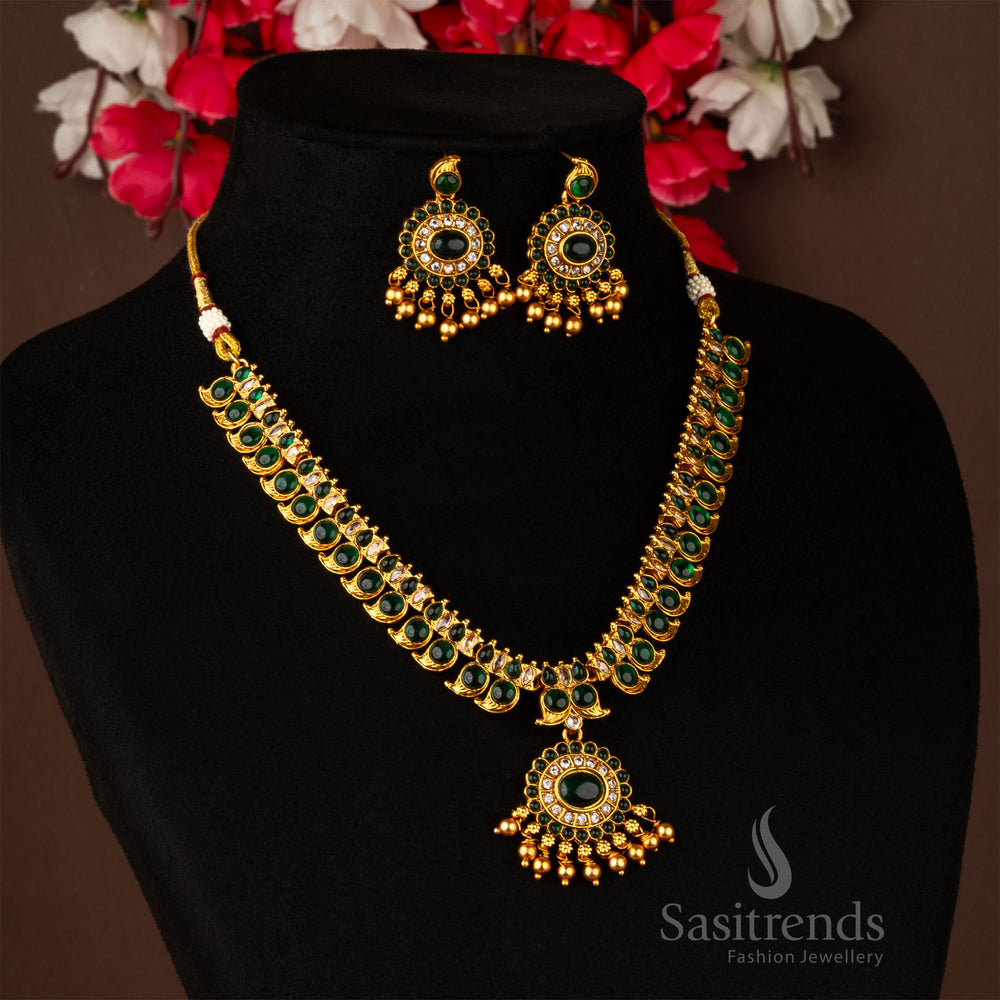 Classic temple-style matte gold necklace with green Kemp mango motifs and coordinated earrings – a heritage jewellery pick – sasitrends