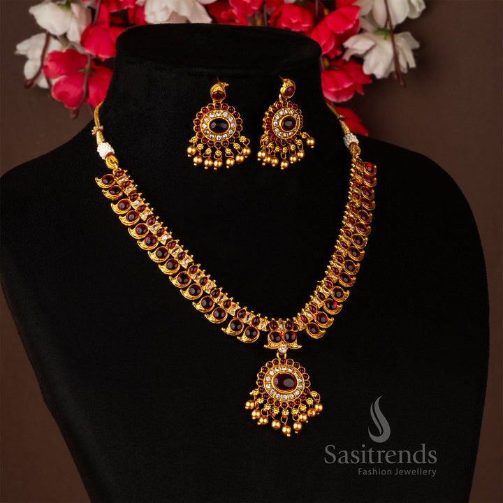 Classic matte gold temple necklace set with ruby-studded mango motifs and detailed earrings – traditional jewellery for weddings and functions – sasitrends