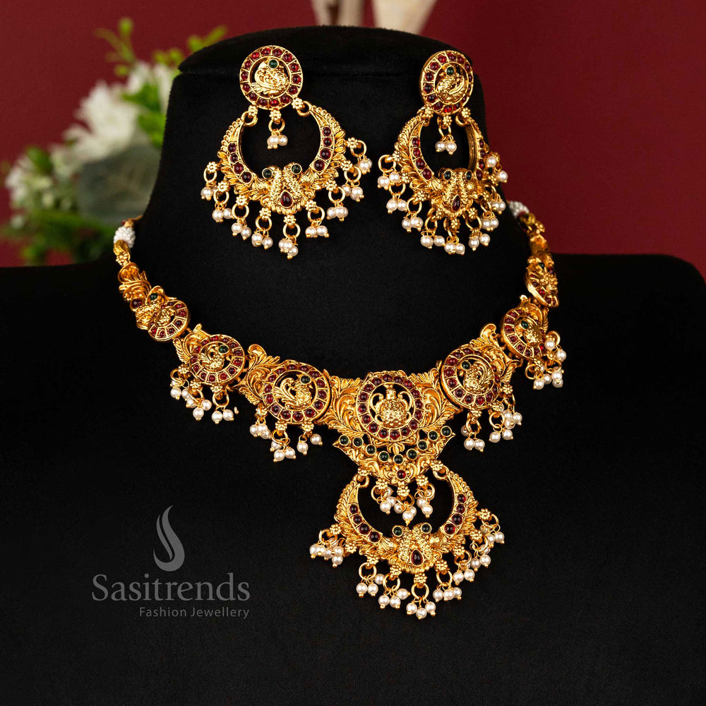 Ruby-green Kemp studded peacock temple jewellery set in matte gold with statement chandbali pendant – classic Indian ethnic wear – sasitrends