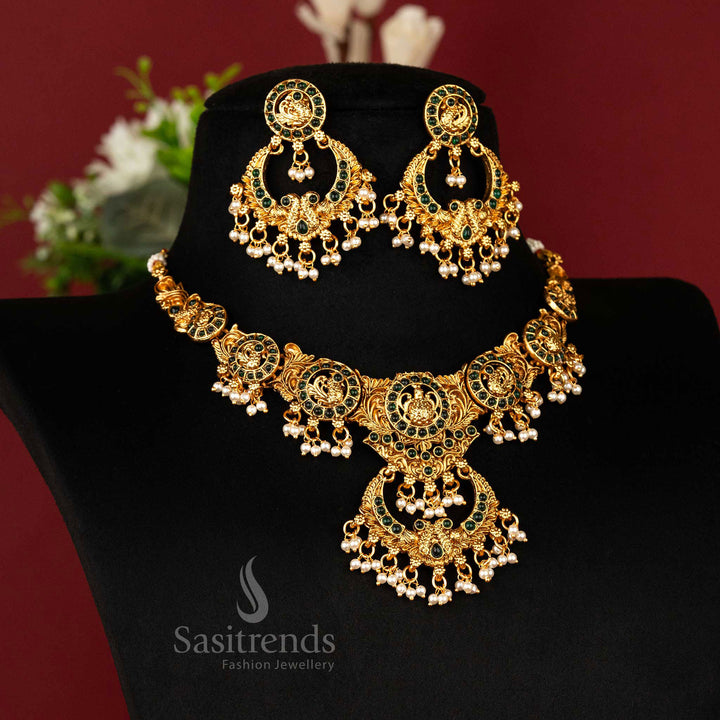 Temple-style peacock necklace with green Kemp stones and matte gold chandbali pendant – a timeless piece of ethnic jewellery – sasitrends