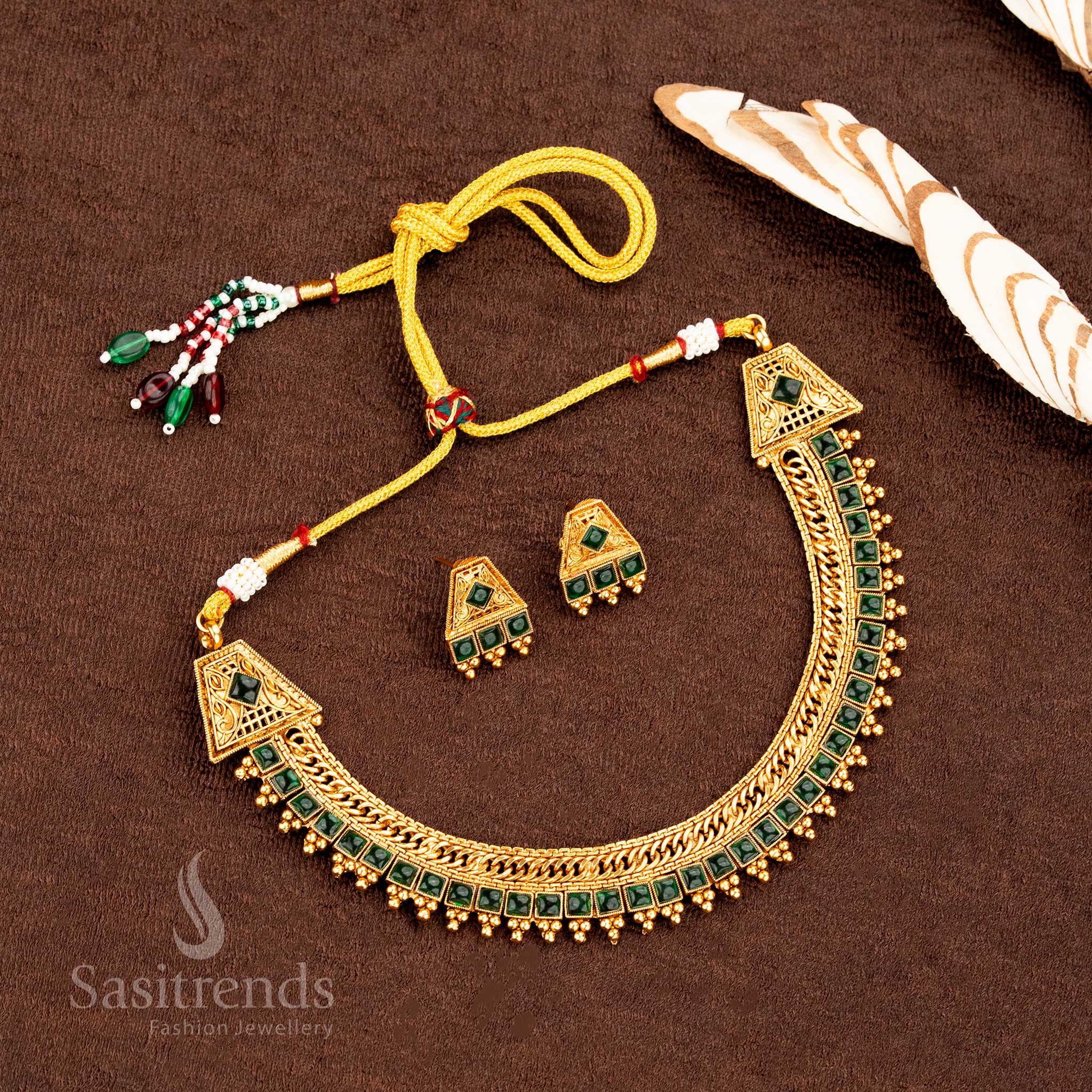 Traditional bride’s matte gold green stone square pattern necklace set, enriched with divine temple vibes, ideal for wedding jewellery elegance and heritage grace by Sasitrends
