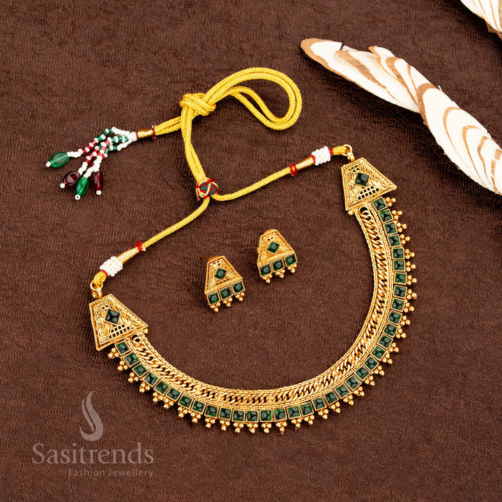 Traditional bride’s matte gold green stone square pattern necklace set, enriched with divine temple vibes, ideal for wedding jewellery elegance and heritage grace by Sasitrends