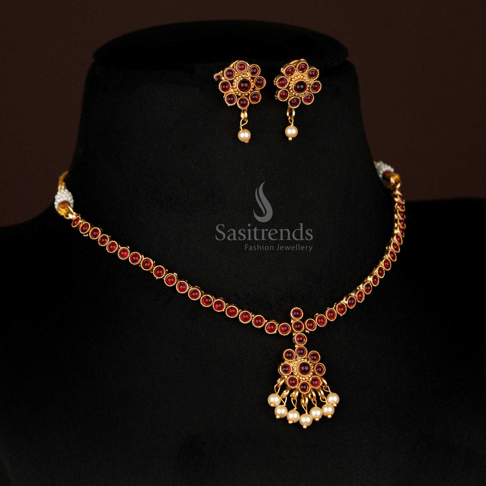 Graceful matte gold necklace with round floral ruby pendant and pearl drops – perfect for traditional bridal styling with ethnic sophistication – Sasitrends