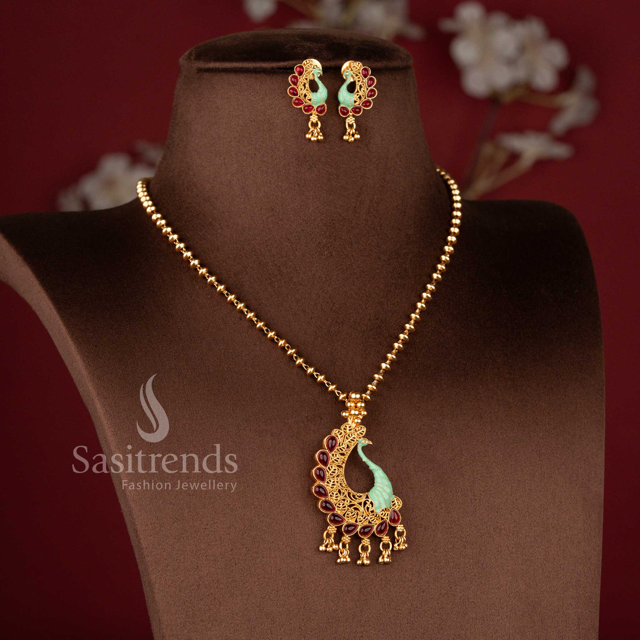 Traditional Classic Matte Gold Plated Peacock Pendant Jewellery Set with Green Stones and Enamel Finish - Sasitrends