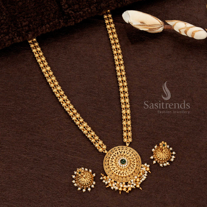 Elegant circular pendant haram with ruby-green stone detailing, pearl hangings, and matching jhumka earrings - Sasitrends