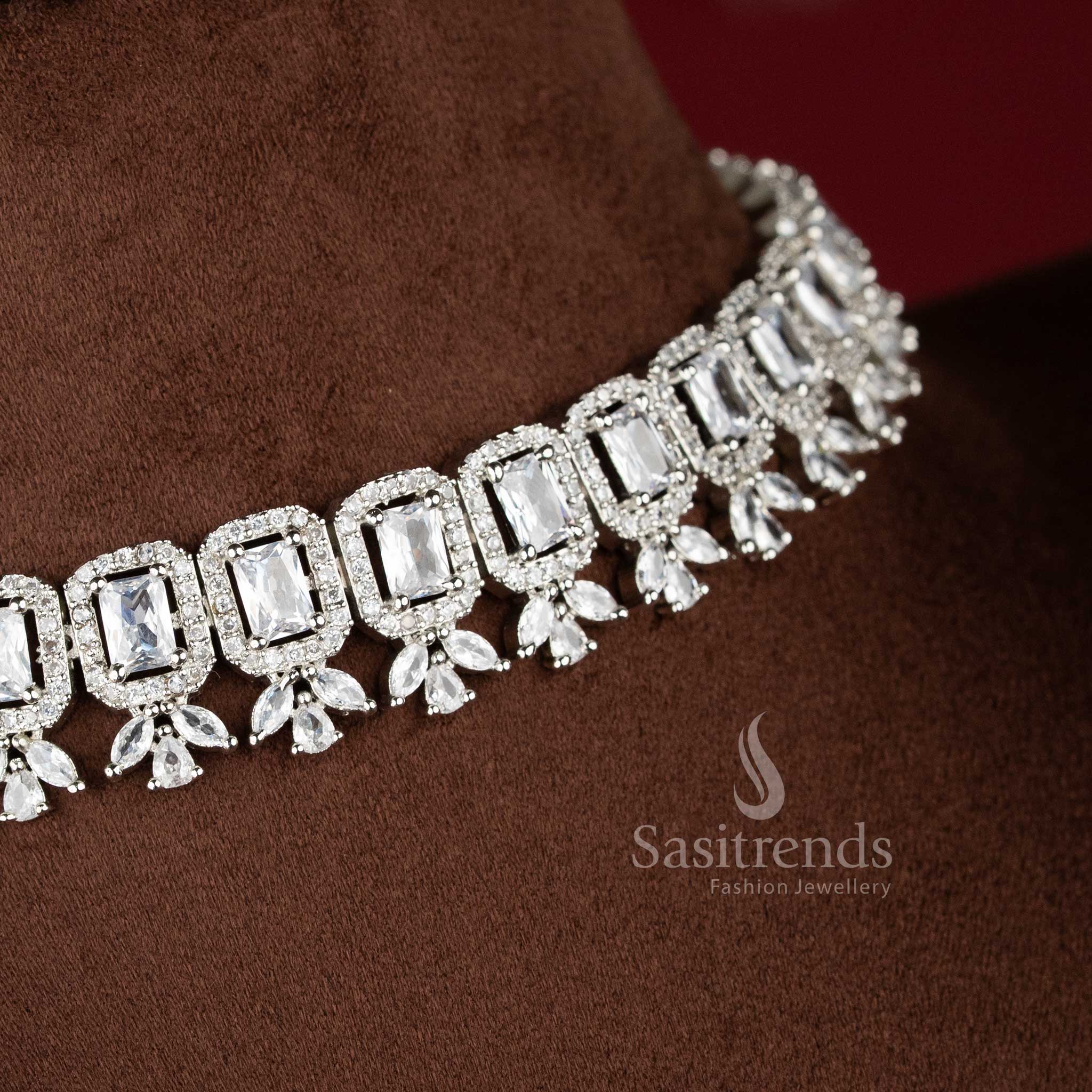 Rhodium silver plated party wear necklace set featuring a repeating sequence of white emerald-cut American Diamonds framed by brilliant stone halos 2021A - Sasitrends