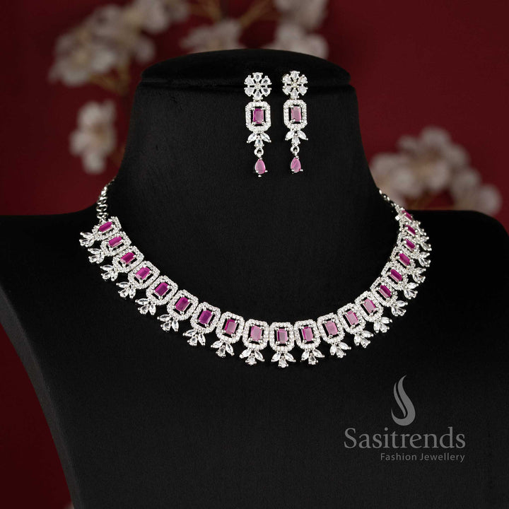 American Diamond Drop Earrings with a floral stud and a rectangular ruby stone centerpiece in a rhodium silver finish 2021B