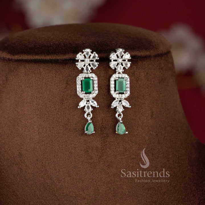 Rhodium silver plated party wear necklace set featuring a repeating sequence of vibrant green emerald-cut American Diamonds framed by brilliant white stone halos - Sasitrends