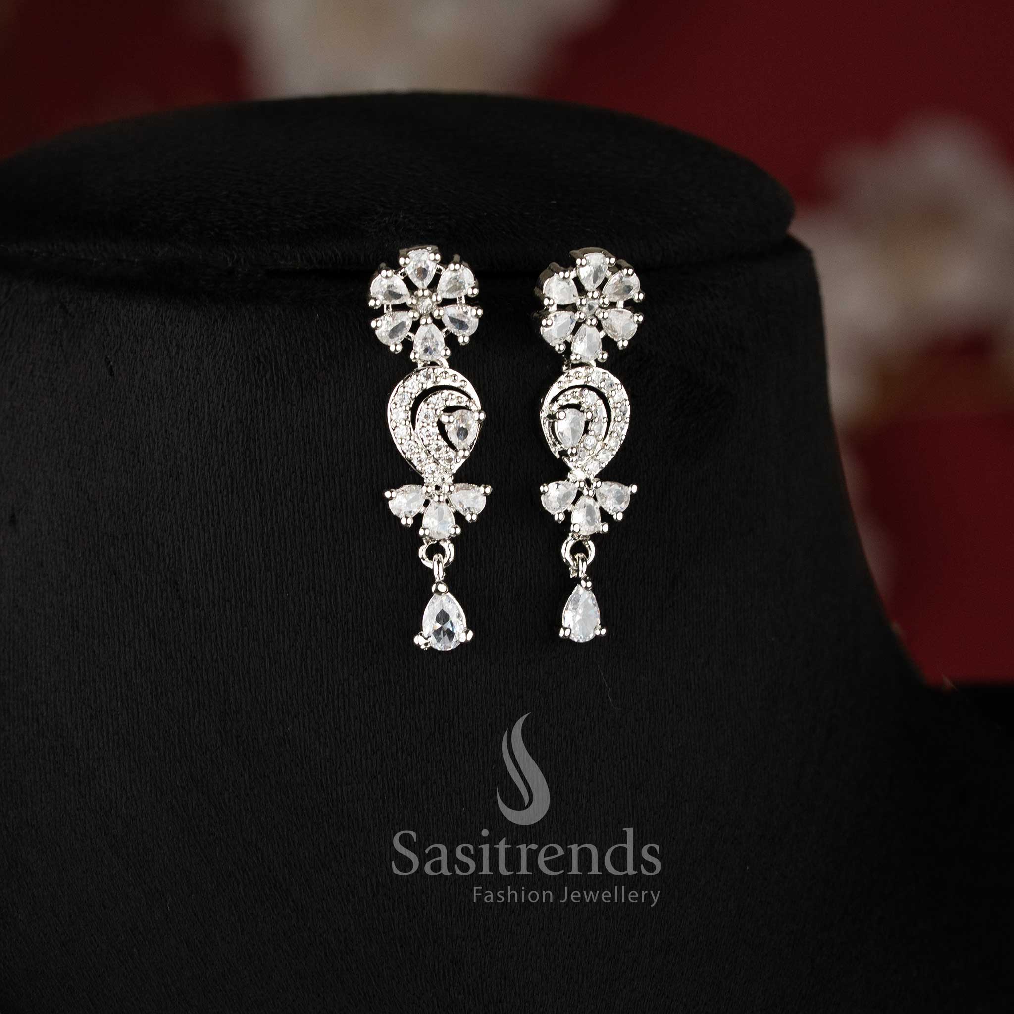 Trendy white stone studded rhodium plated necklace set featuring detailed floral motifs - Sasitrends