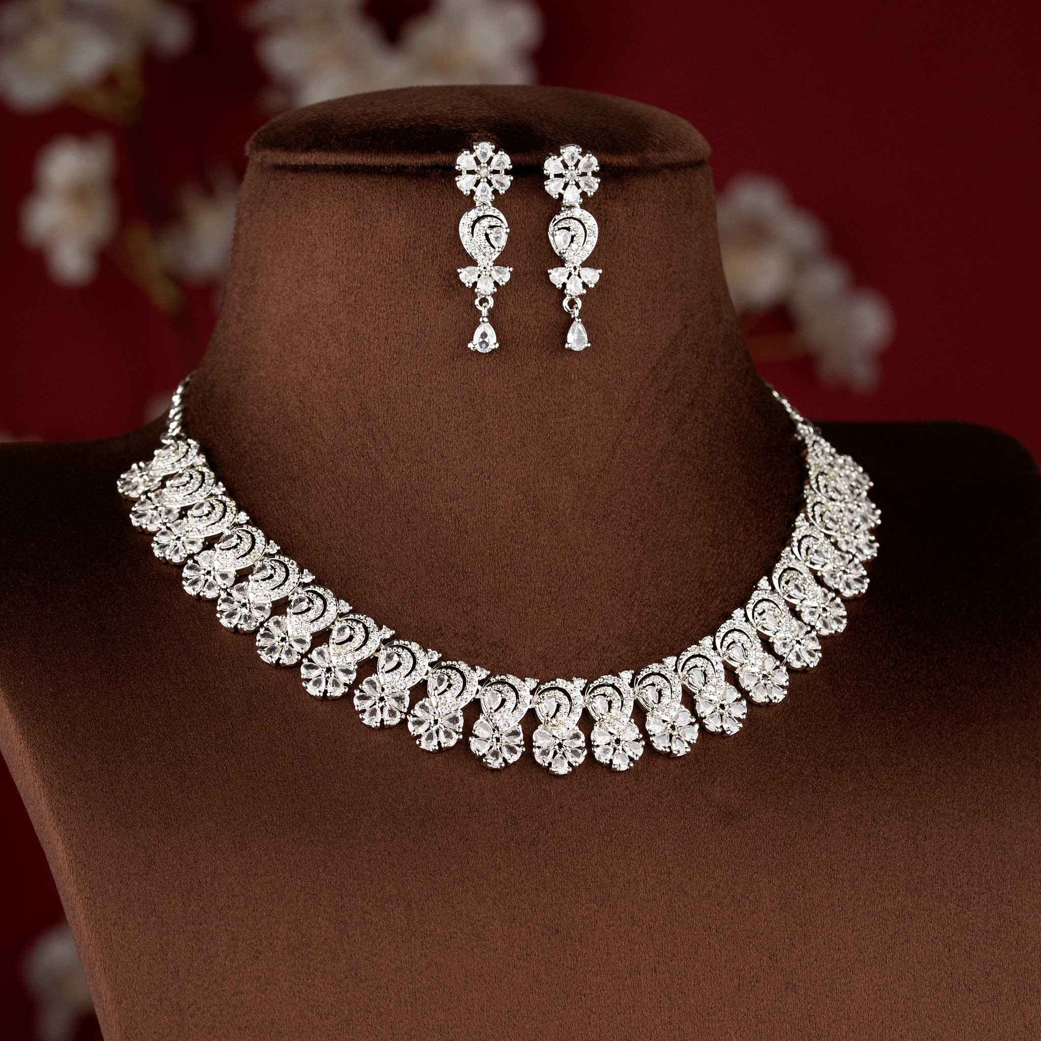 Beautiful White American diamond necklace set with floral arrangement suitable for bridal and reception wear - sasitrends