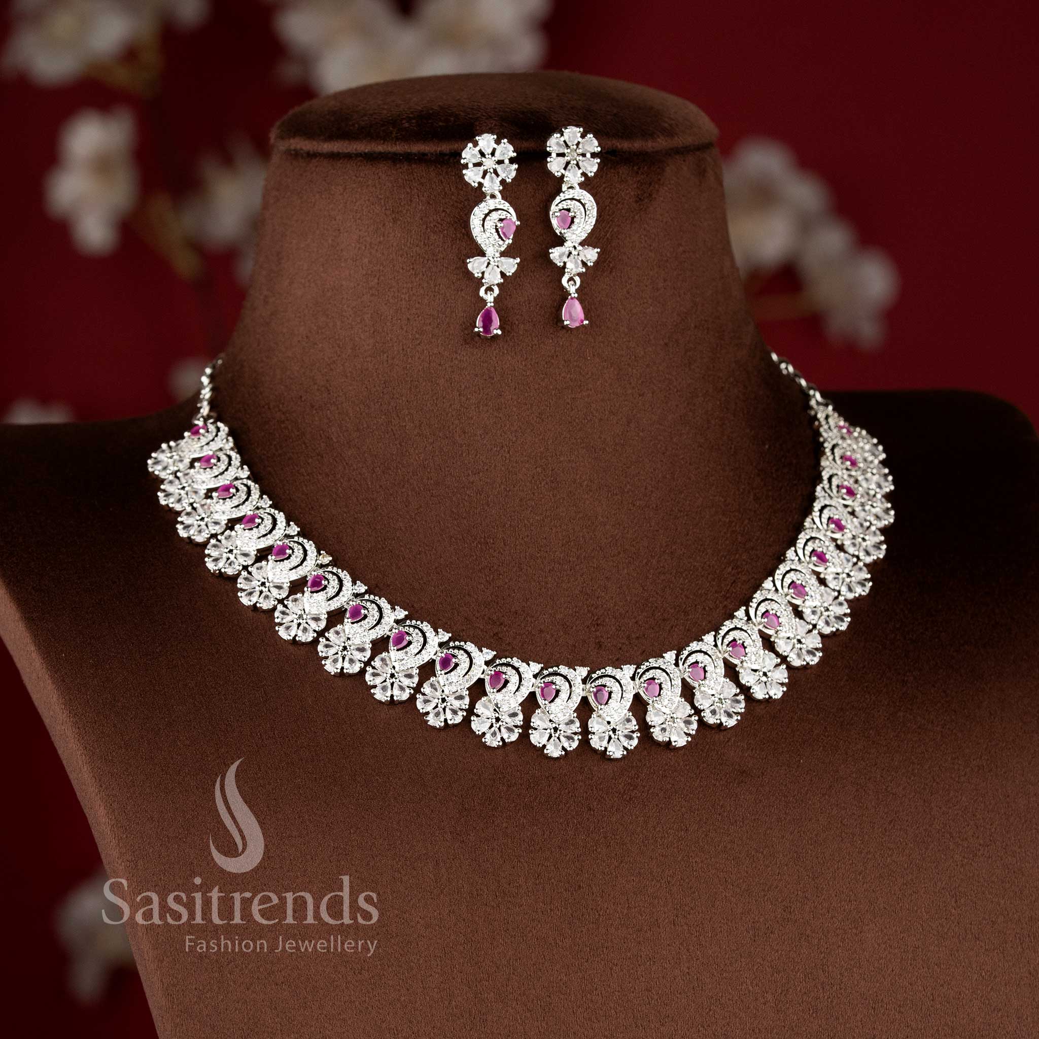 Beautiful ruby American diamond necklace set with floral arrangement suitable for bridal and reception wear - Sasitrends