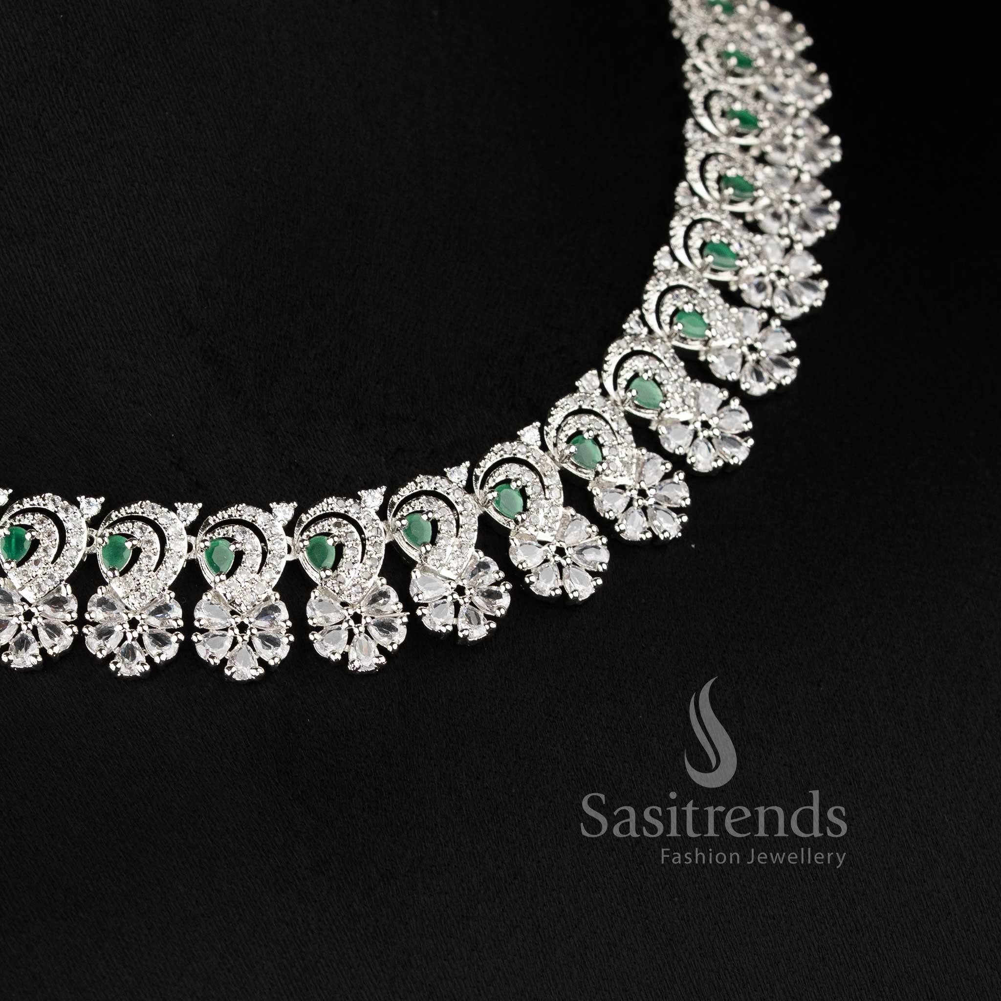 Elegant green AD stone necklace set with intricate floral design and matching earrings for festive occasions - Sasitrends