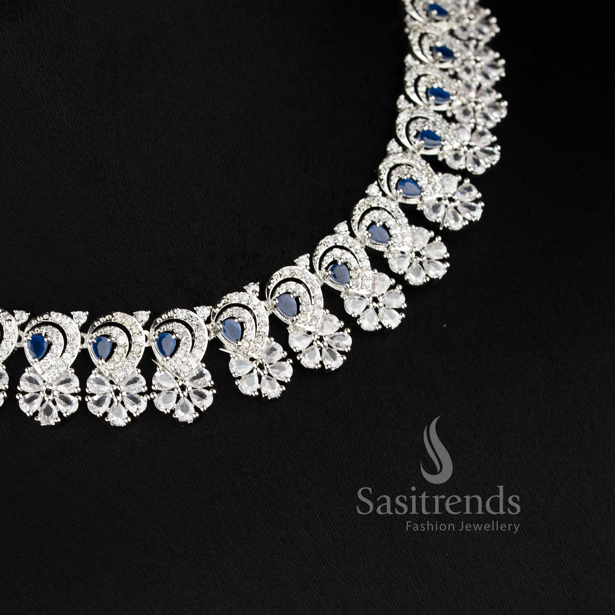 Stylish blue AD floral necklace set with matching earrings for festive and party wear - sasitrends