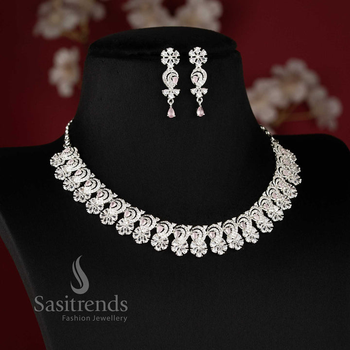 Elegant pink AD stone necklace set with intricate floral design and matching earrings for festive occasions - sasitrends