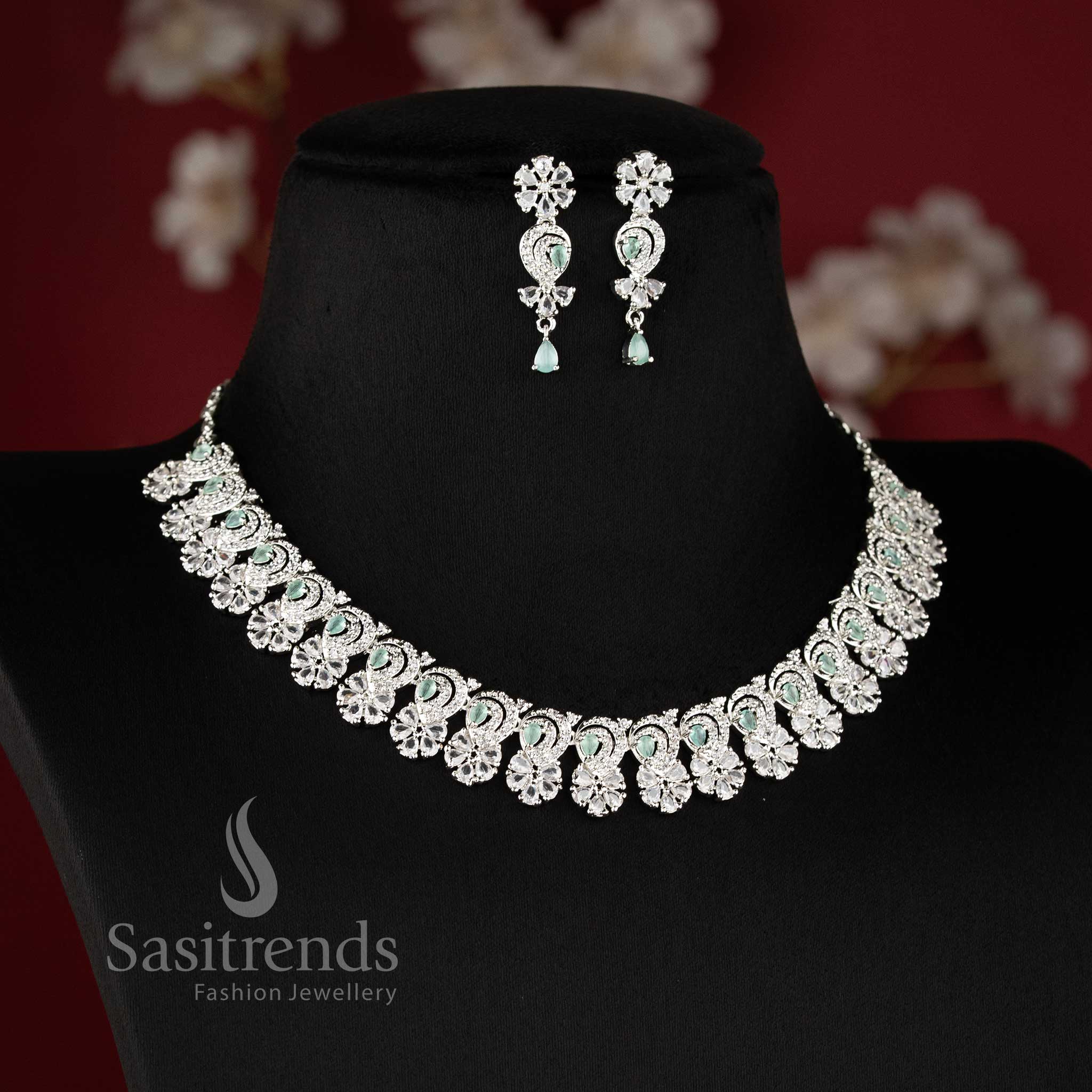 Elegant mint AD stone necklace set with intricate floral design and matching earrings for festive occasions - sasitrends