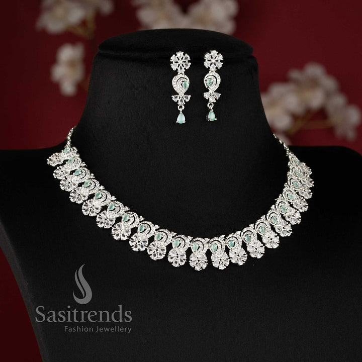 Elegant mint AD stone necklace set with intricate floral design and matching earrings for festive occasions - sasitrends