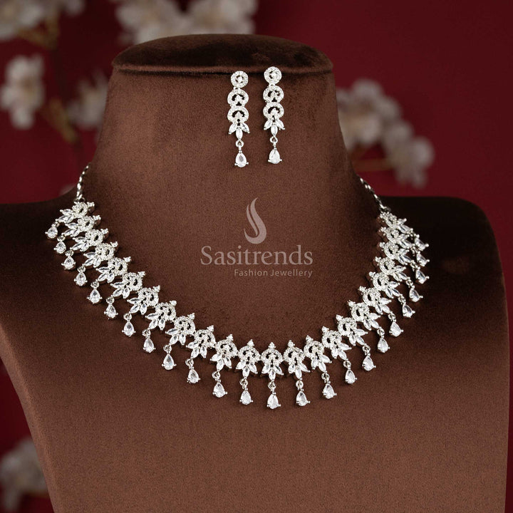 Elegant white AD stone floral leaf drop necklace set with dangling teardrop design for saree and reception wear - sasitrends