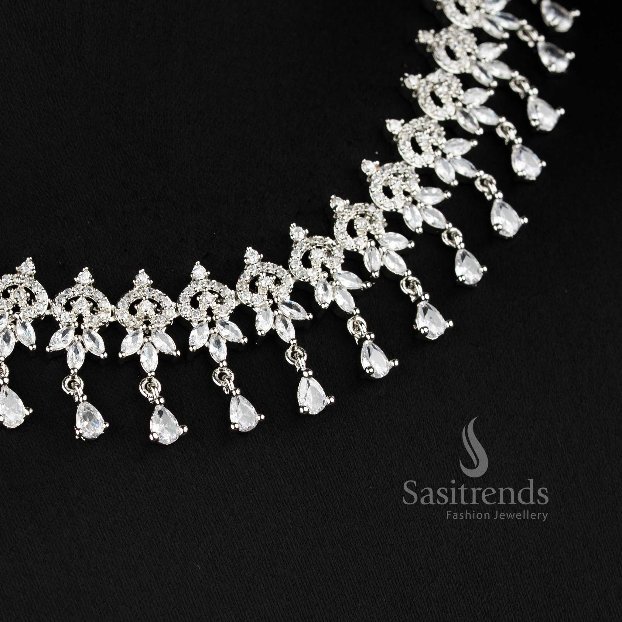 Trendy white American diamond floral dangle necklace set with intricate leaf pattern for wedding and party wear - sasitrendS