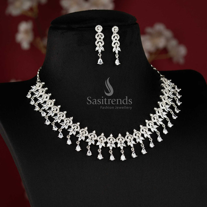 White color rhodium plated floral cluster American diamond necklace set with teardrop danglers for bridal wear - sasitrendS
