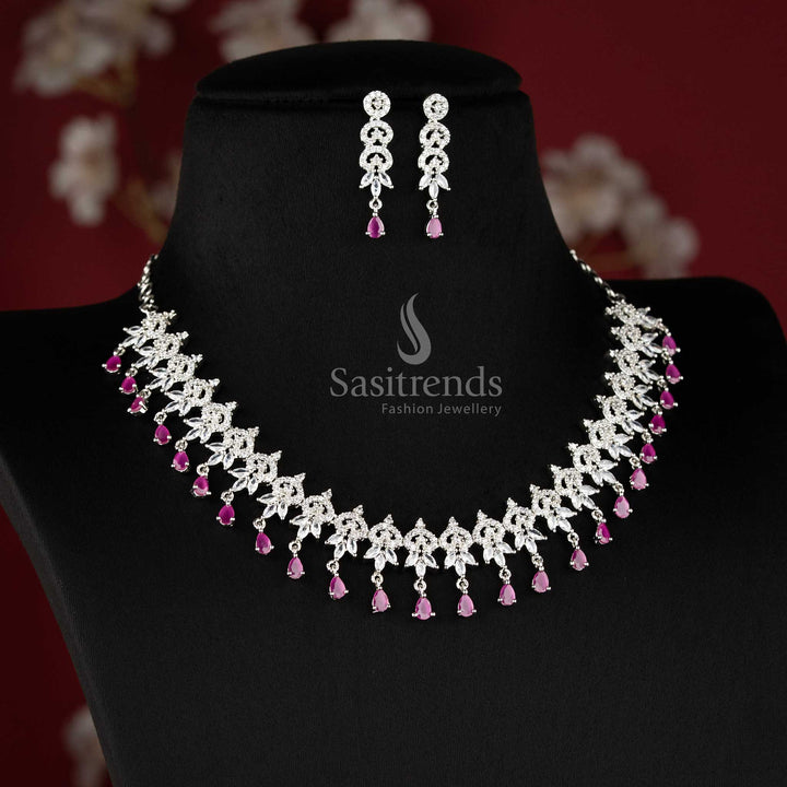 Ruby color rhodium plated floral cluster American diamond necklace set with teardrop danglers for bridal wear - sasitrends