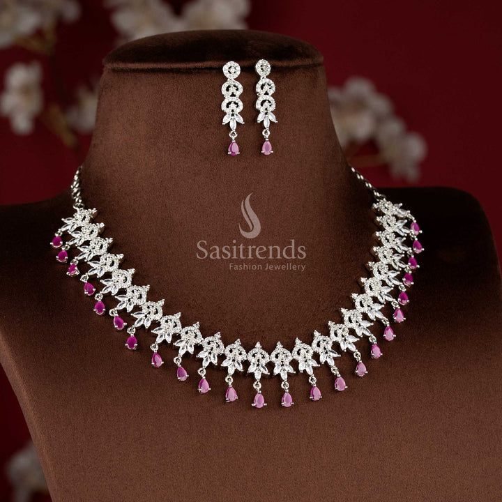 Ruby color rhodium plated floral cluster American diamond necklace set with teardrop danglers for bridal wear - sasitrends