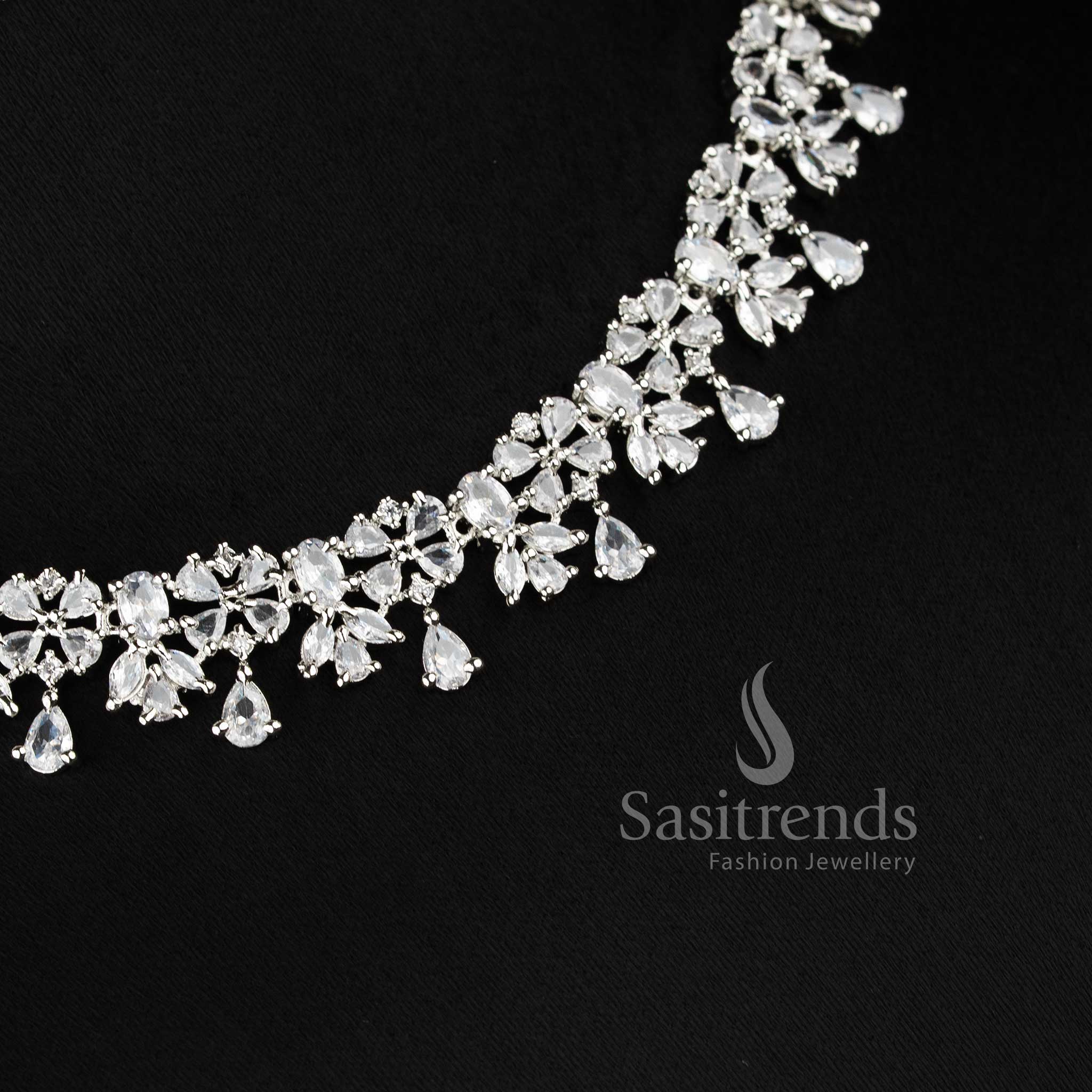Trendy white American diamond floral dangle necklace set with intricate design for wedding and party wear - sasitrends