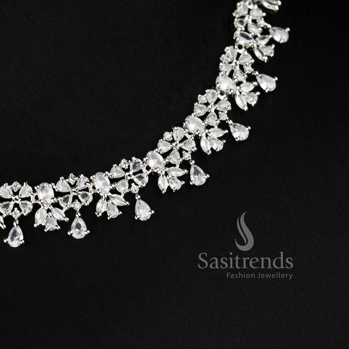 Trendy white American diamond floral dangle necklace set with intricate design for wedding and party wear - sasitrends