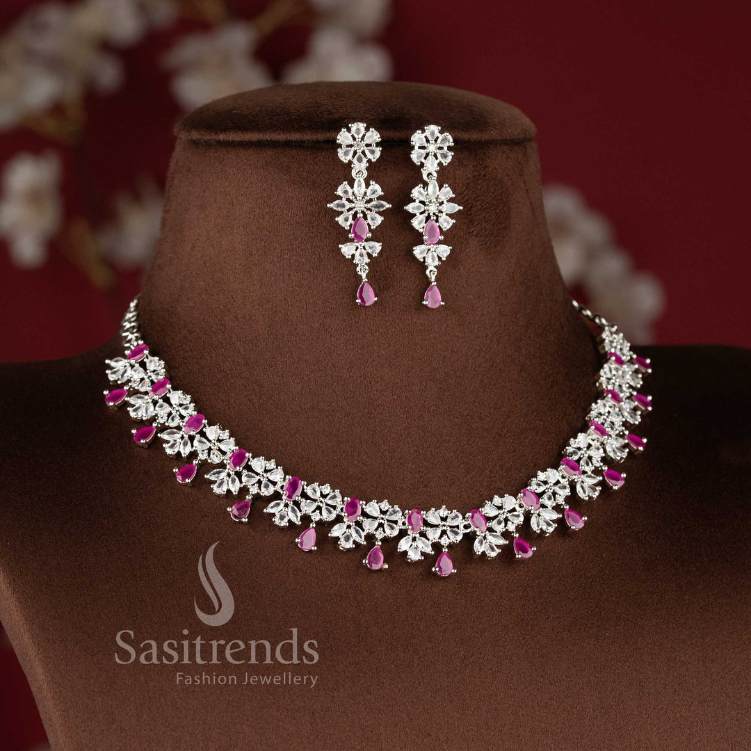 Ruby color rhodium plated floral American diamond necklace set with teardrop danglers for bridal wear - sasitrends