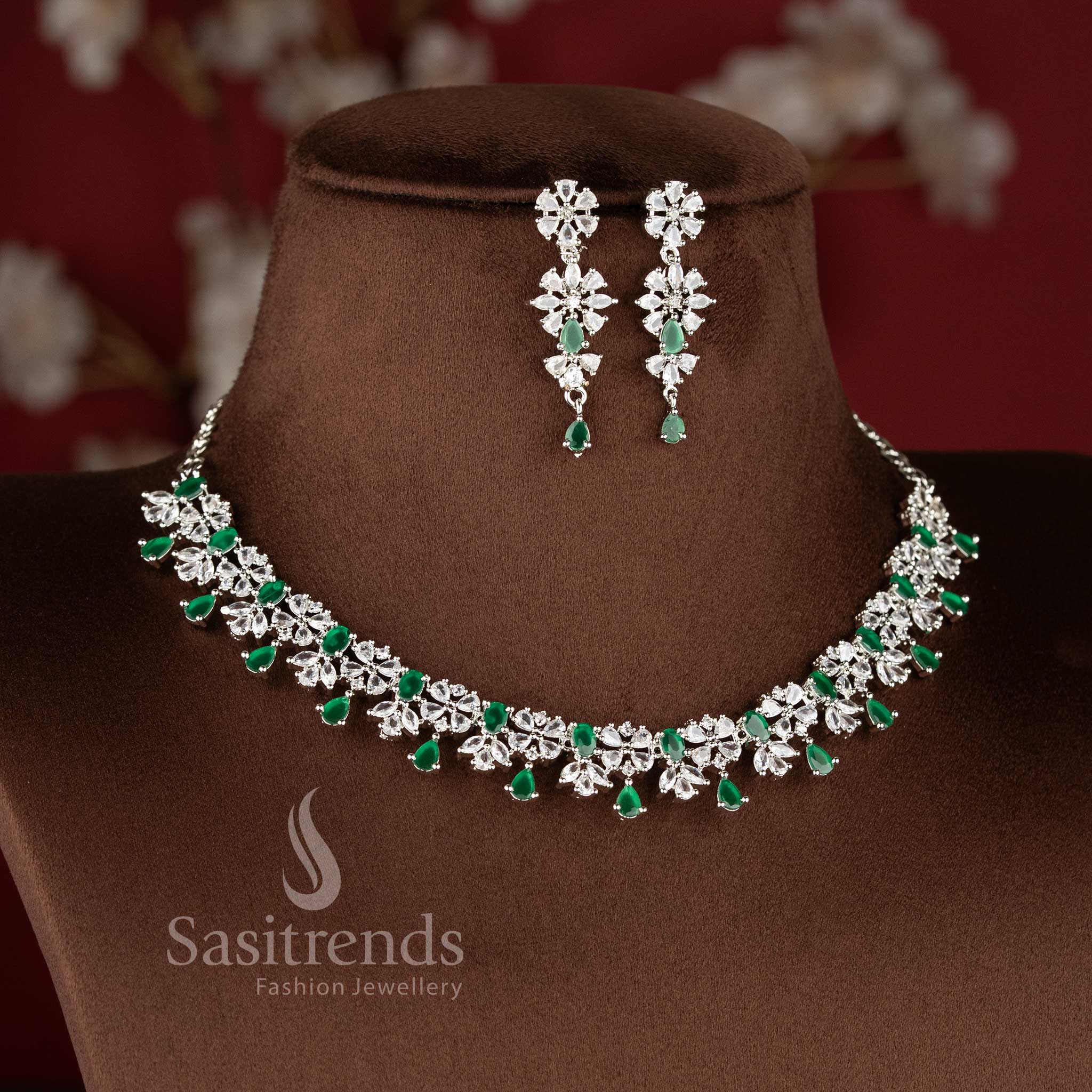 Green color rhodium plated floral American diamond necklace set with teardrop danglers for bridal wear - sasitrends
