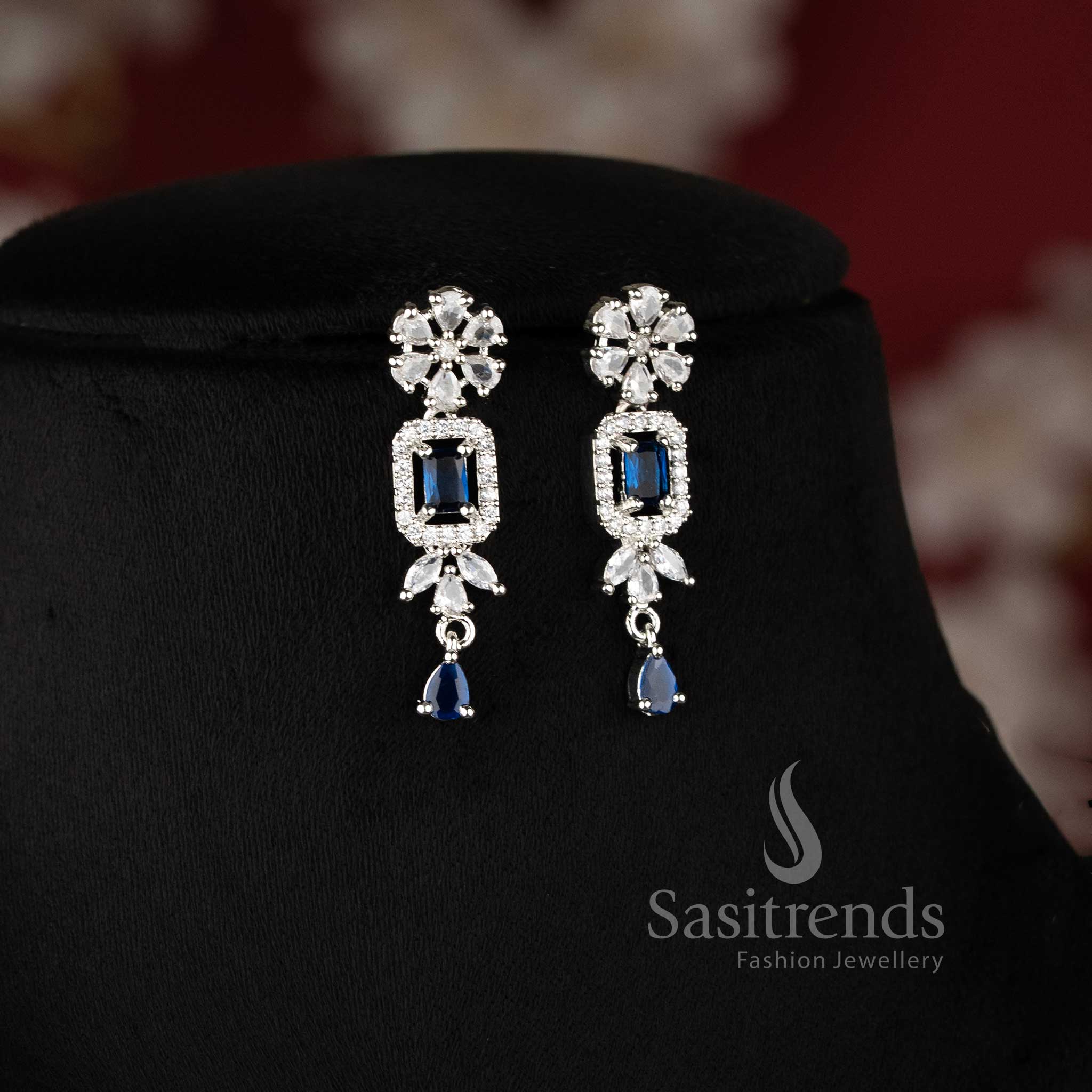 Blue color rhodium plated floral American diamond necklace set with teardrop danglers for bridal wear - sasitrends