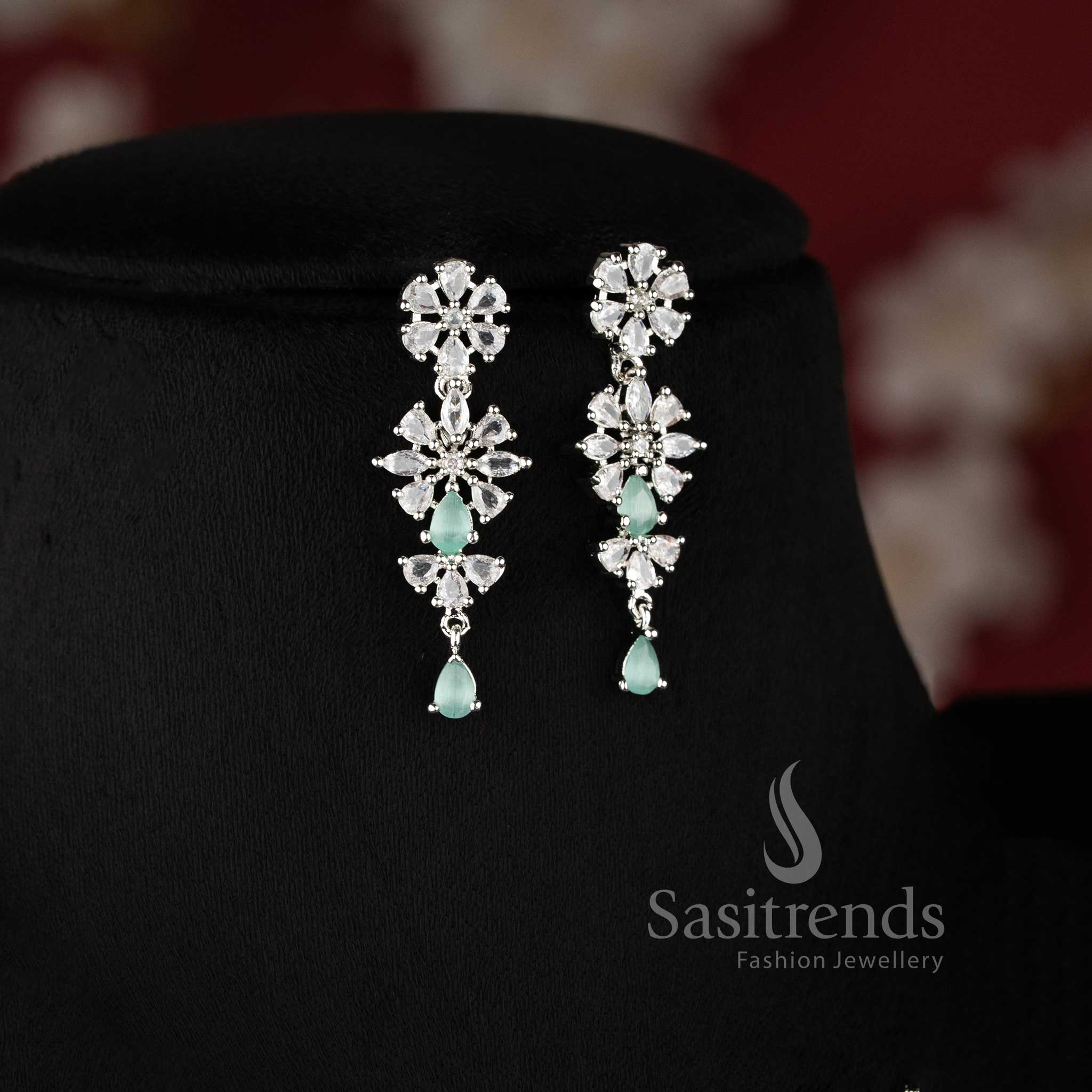 Mint color rhodium plated floral American diamond necklace set with teardrop danglers for bridal wear - sasitrends