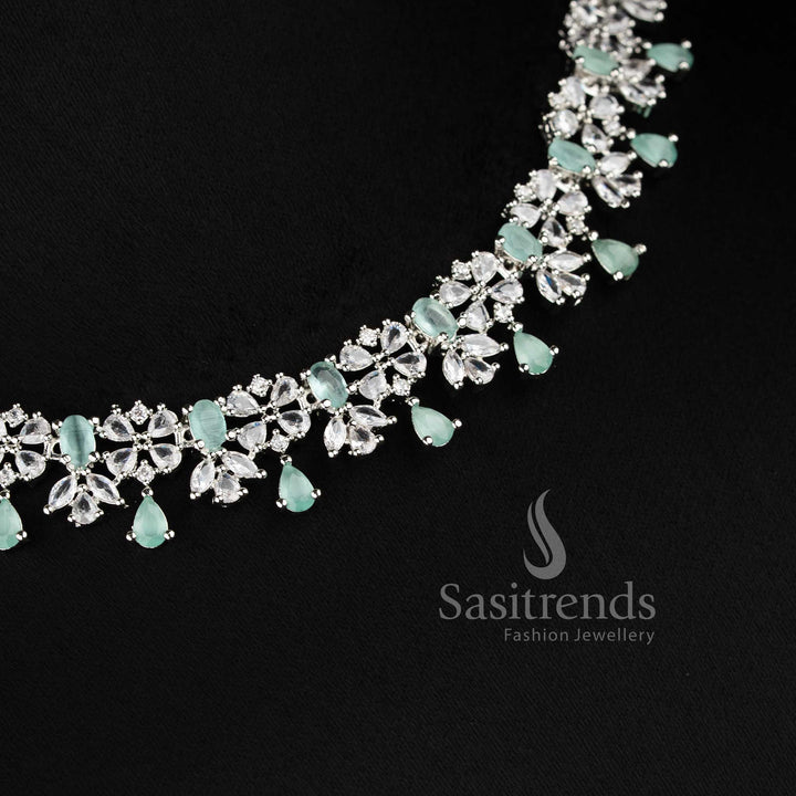 Beautiful mint AD floral necklace set with teardrop hanging design for lehenga and bridal styling - sasitrends