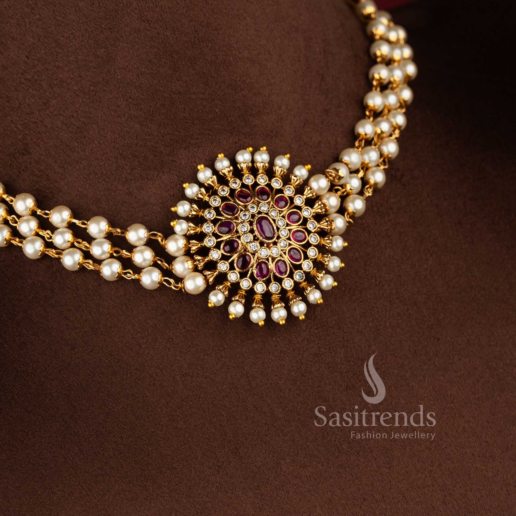 Trendy Three-Layer Pearl Choker Necklace Jewellery Set with Floral Pendant in Ruby White Stone Design and Temple Matte Gold Plated Finish - Sasitrends