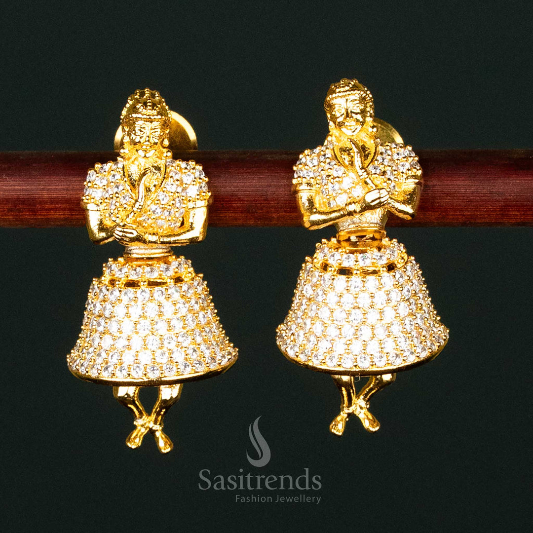 Classic white American Diamond gold-plated brass jhumka earrings, perfect for temple wear with a regal touch - Sasitrends