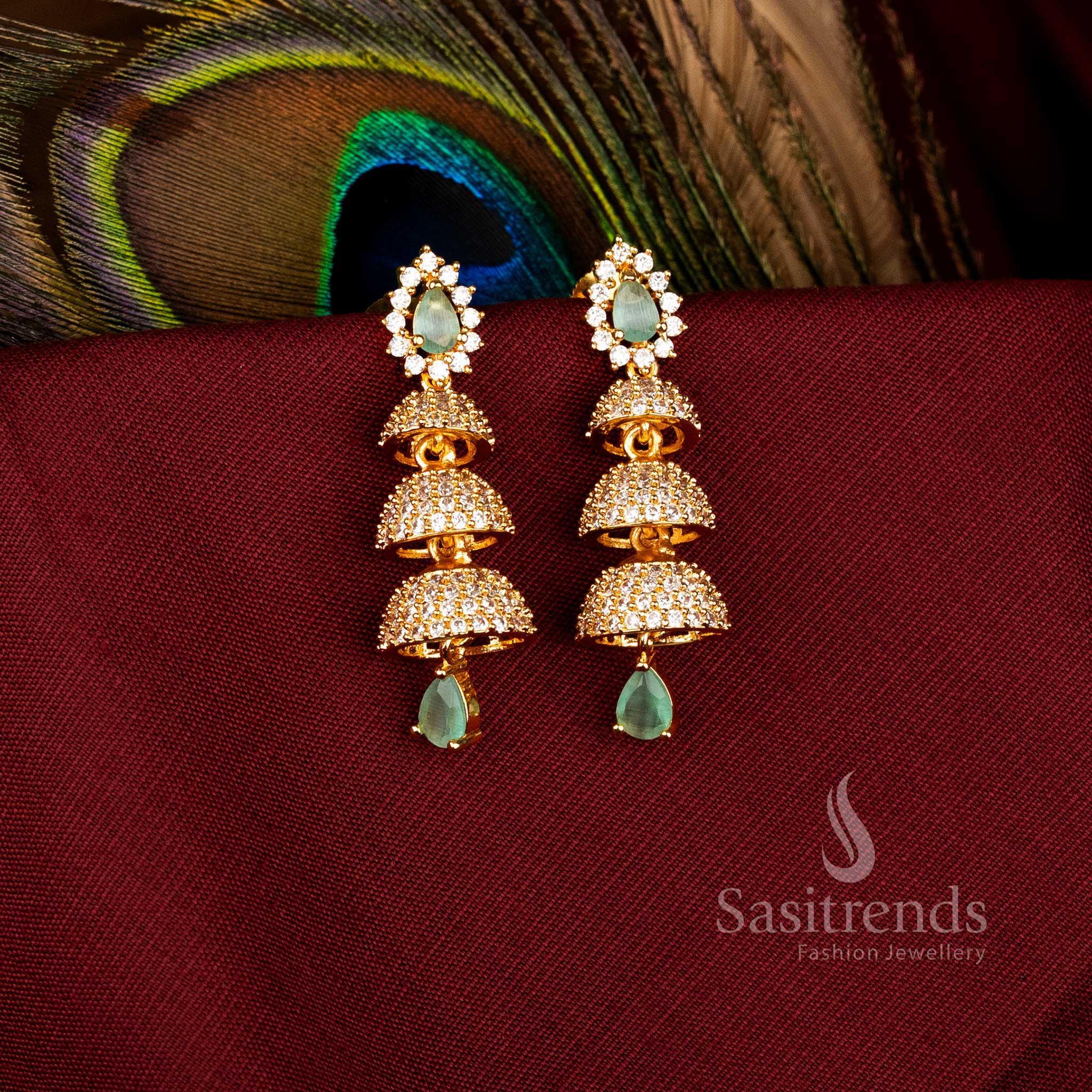 Majestic American Diamond Gold Plated Brass Triple Layer Bell Pattern Jhumka Earrings for Bridal Look – Sasitrends