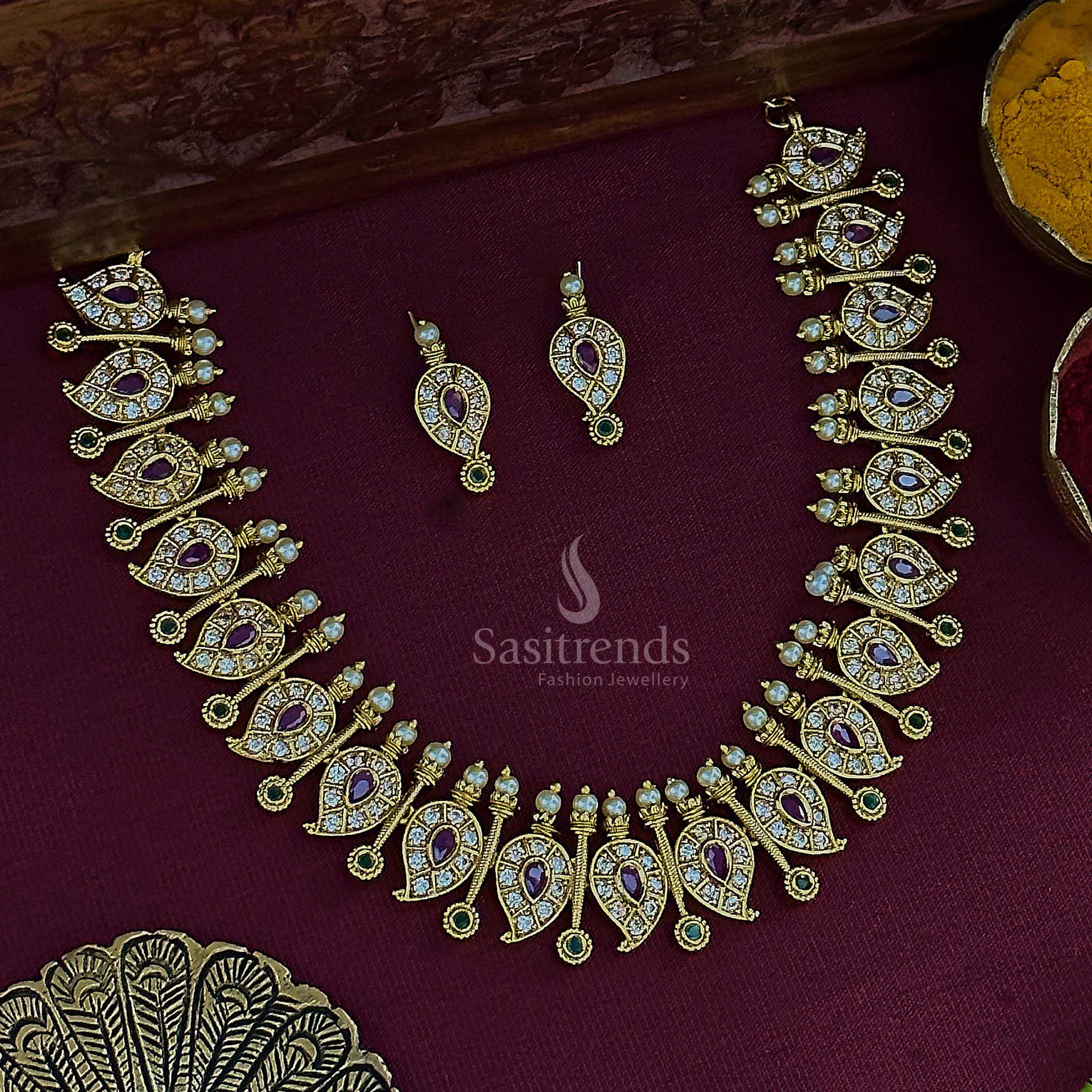 Traditional necklace with multi-color mango and stick motifs, adorned with American diamond stones, pearls, and colorful stones - Sasitrends