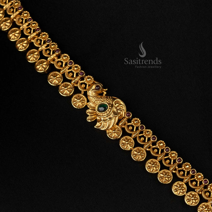 Exquisite temple-design long jewellery set featuring Lakshmi and peacock motifs, enhanced with AD stones - Sasitrends