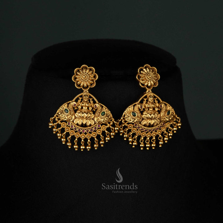 Exquisite temple-design long jewellery set featuring Lakshmi and peacock motifs, enhanced with AD stones - Sasitrends