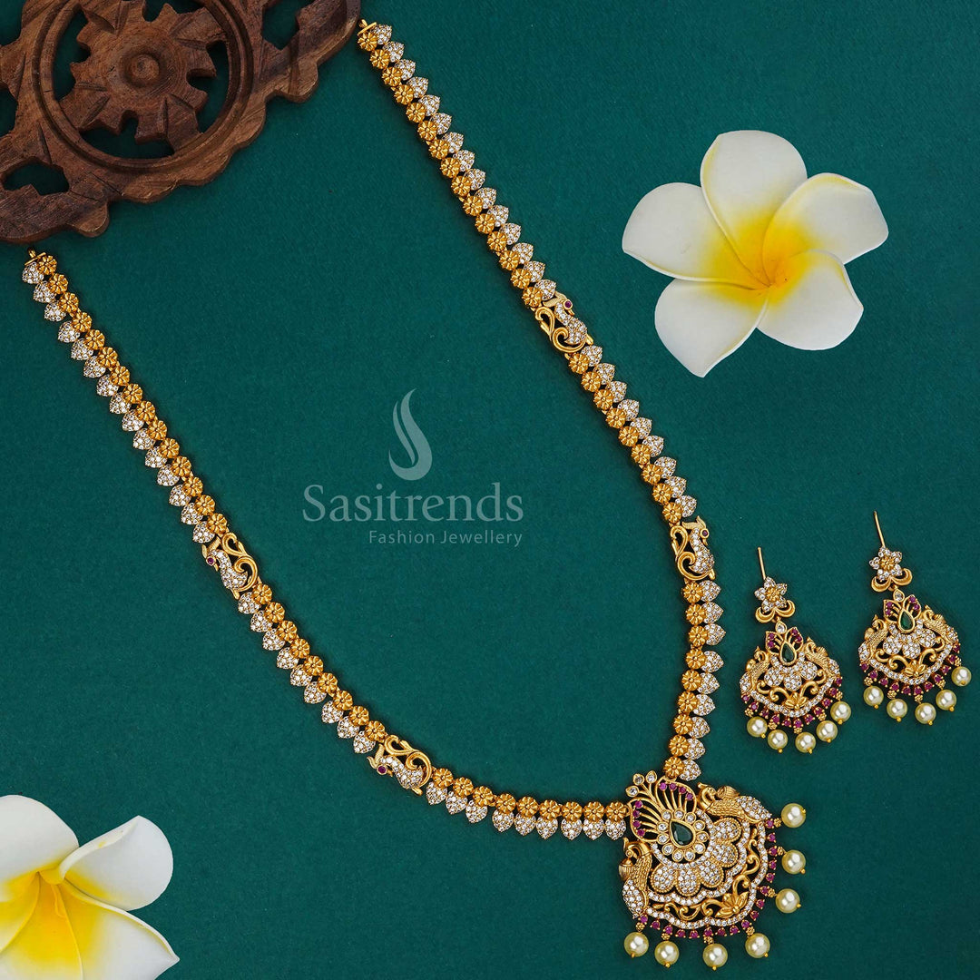 Exquisite temple haram jewellery set crafted in matte gold with ornate multi colour embellishments and jhumkas designed for lavish weddings regal elegance and heritage traditions – Sasitrends