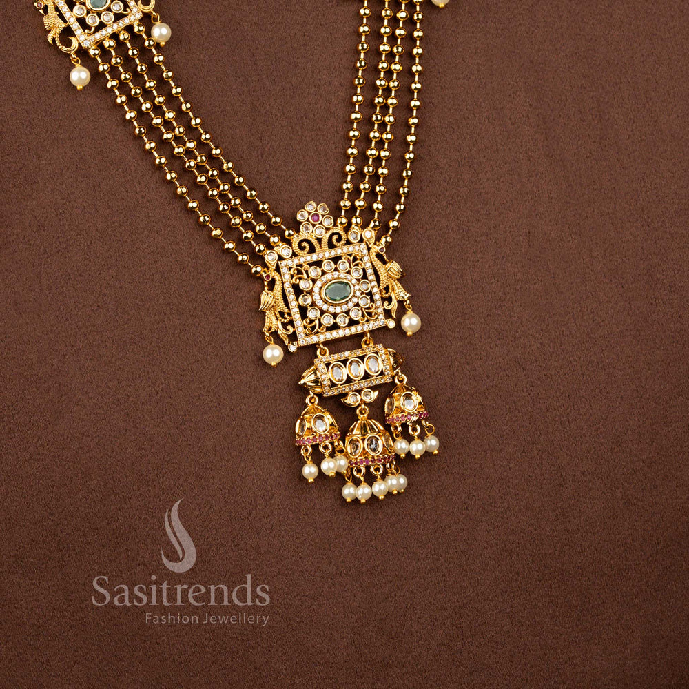 Matte Gold Plated Dual Peacock Square Earrings with American Diamond Detailing, Pearl Jhumki Drops and Green Centre Stone - Sasitrends