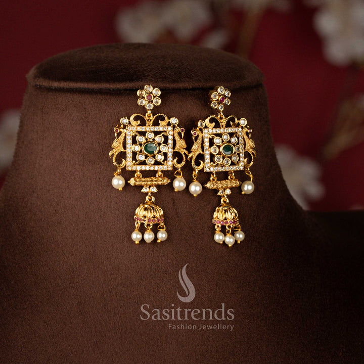 Close-up of Matte Gold Plated Triple Bead Layer Chain with Dual Peacock Square Filigree Connector and Green Centre Stone - Sasitrends