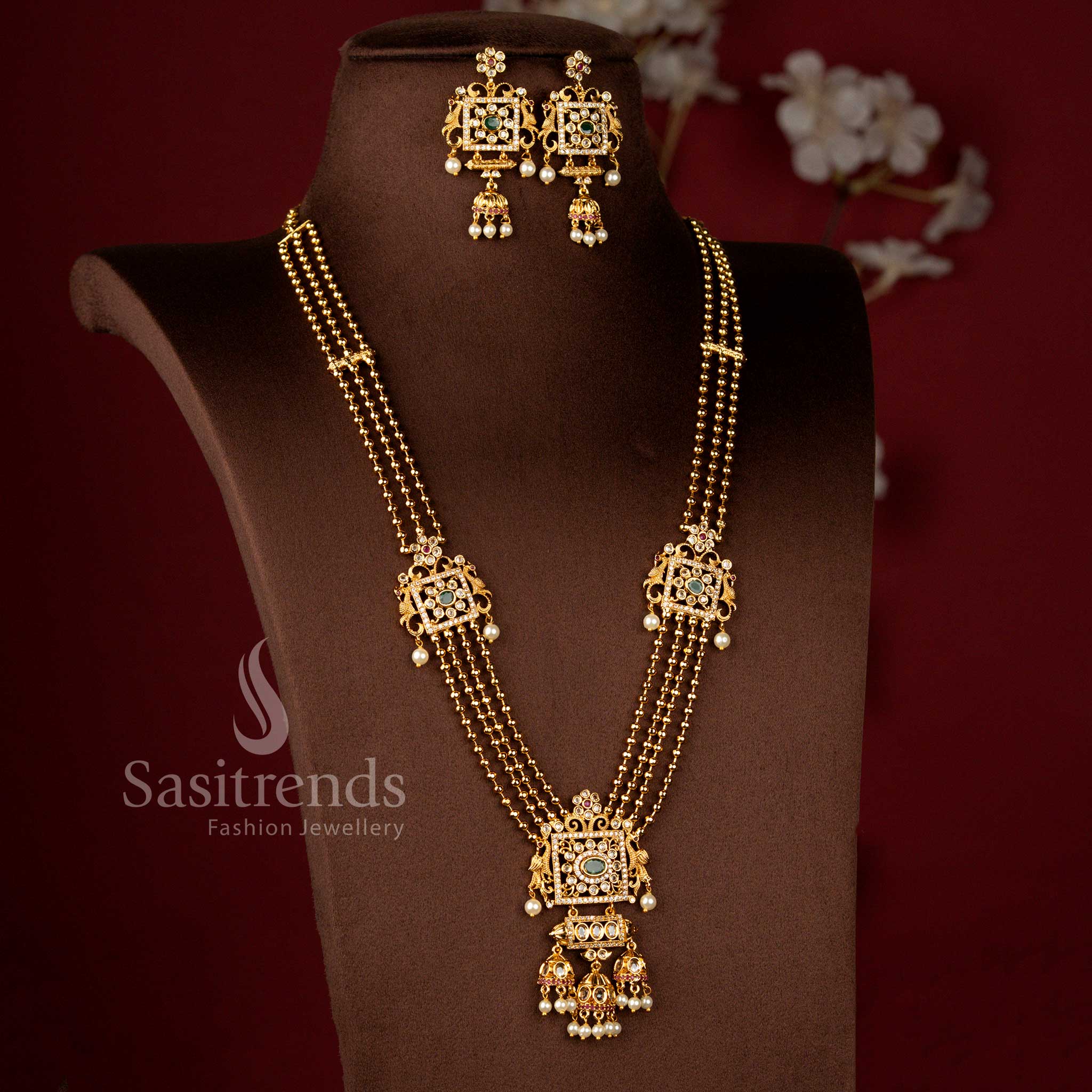 Matte Gold Plated Dual Peacock Square Earrings with American Diamond Detailing, Pearl Jhumki Drops and Green Centre Stone - Sasitrends