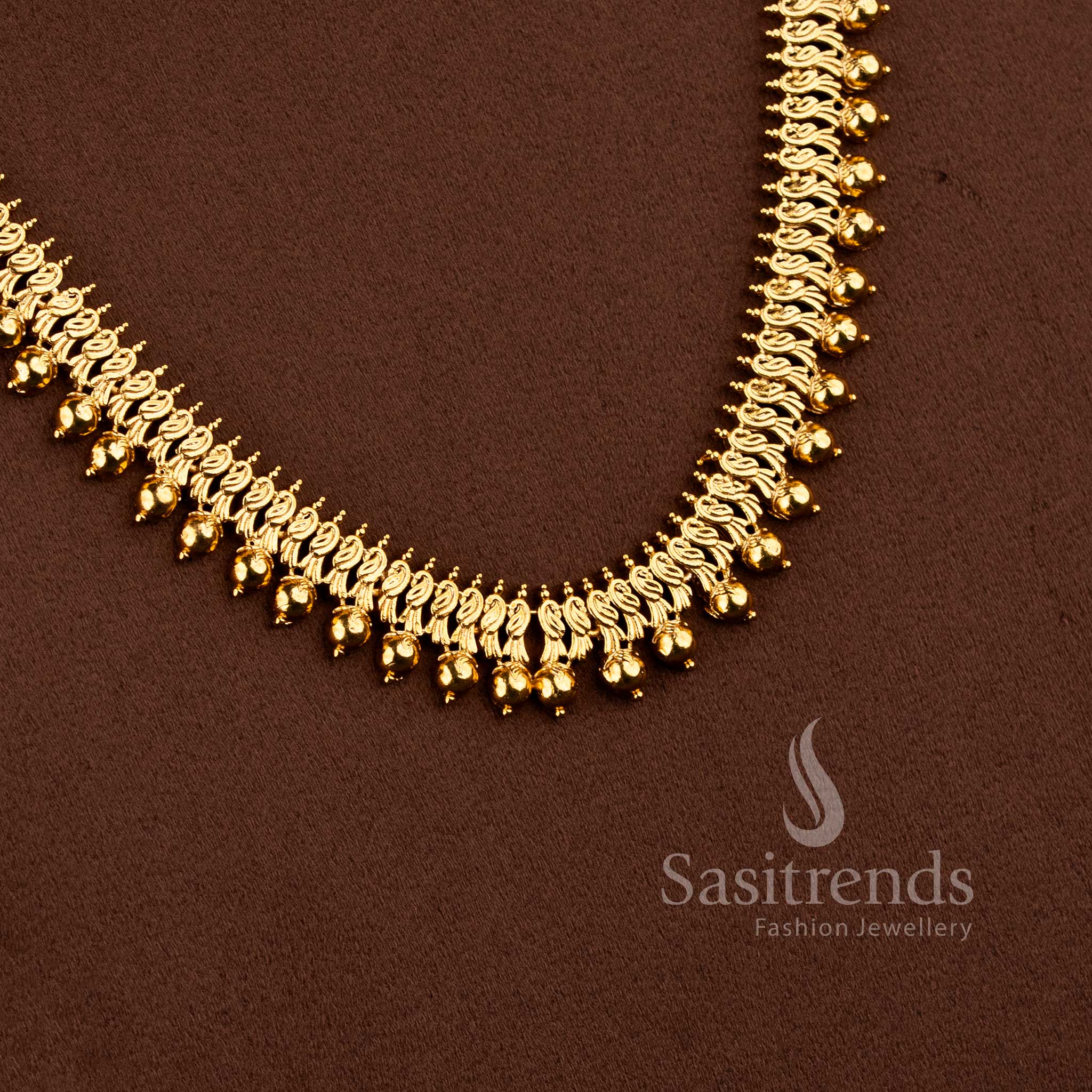 Grand bridal traditional matte gold peacock floral long necklace jewellery set with jhumkas in ruby green by Sasitrends.