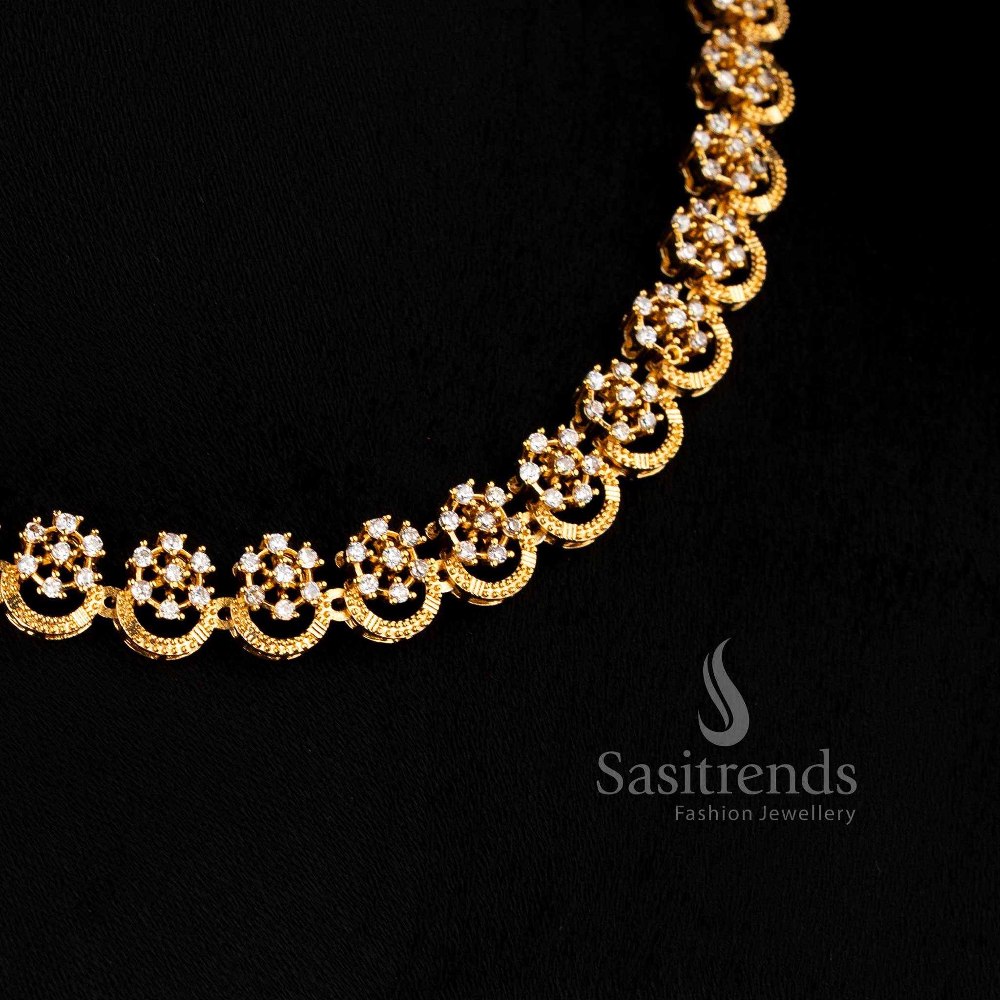 Trendy temple matte gold finish flower AD stone studded jewellery set with elegant floral designs and a traditional sparkle touch – perfect for festive and ethnic wear – Sasitrends