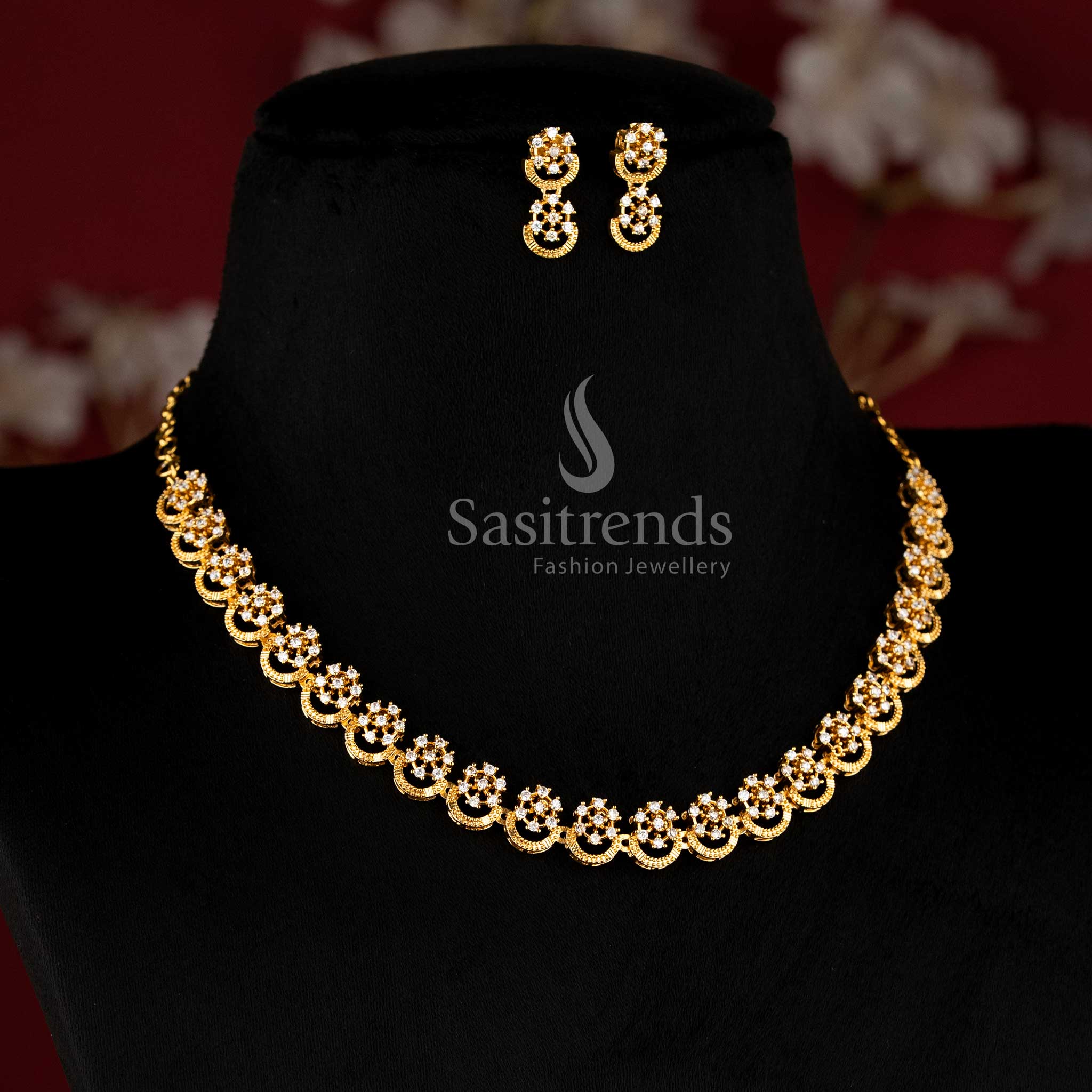 Trendy temple matte gold finish flower AD stone studded jewellery set with elegant floral designs and a traditional sparkle touch – perfect for festive and ethnic wear – Sasitrends