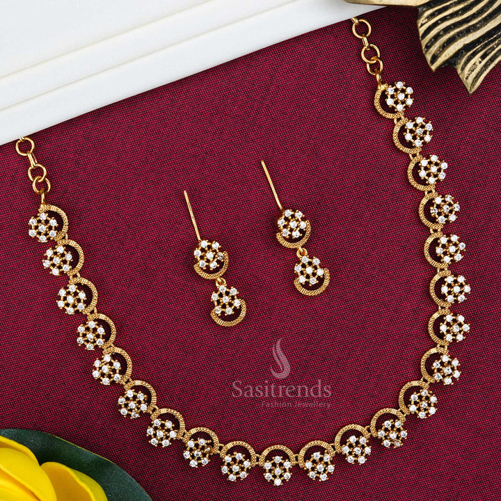 Trendy temple matte gold finish flower AD stone studded jewellery set with elegant floral designs and a traditional sparkle touch – perfect for festive and ethnic wear – Sasitrends
