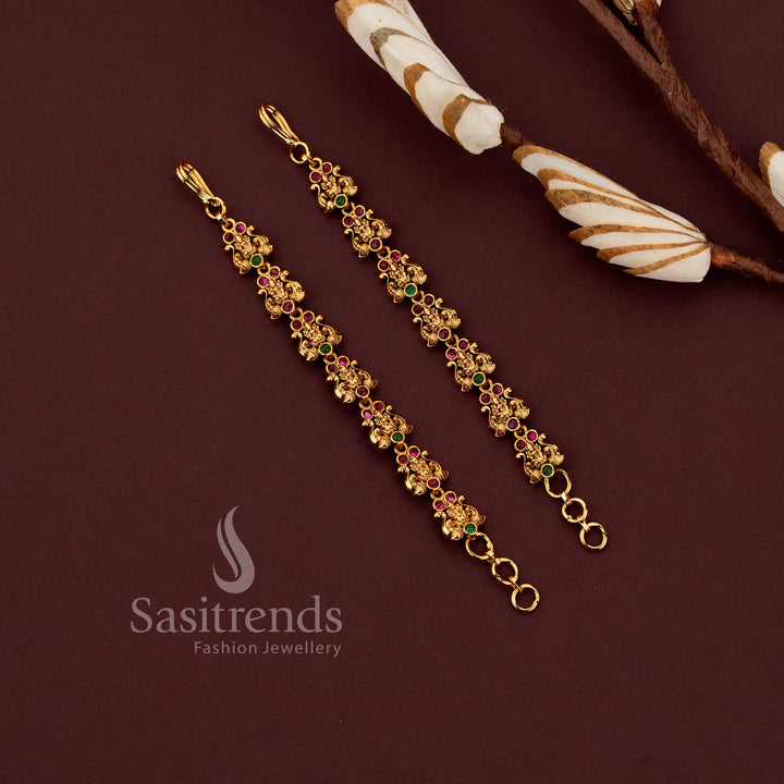 South Indian temple jewellery matil ear chain with antique gold finish and stone detailing.