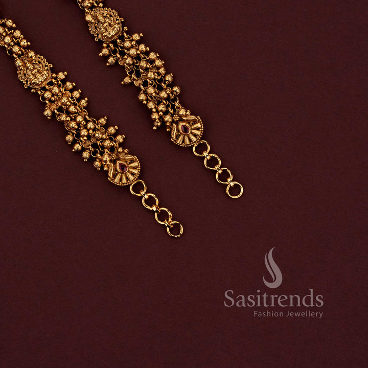 Temple matte gold plated ear chains featuring Lakshmi design with gold beads and pearl bead detailing in multi strand pattern - Sasitrends