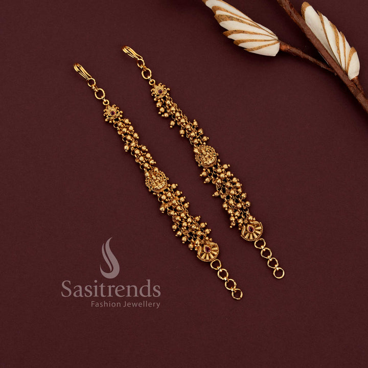 Temple matte gold plated ear chains featuring Lakshmi design with gold beads and pearl bead detailing in multi strand pattern - Sasitrends